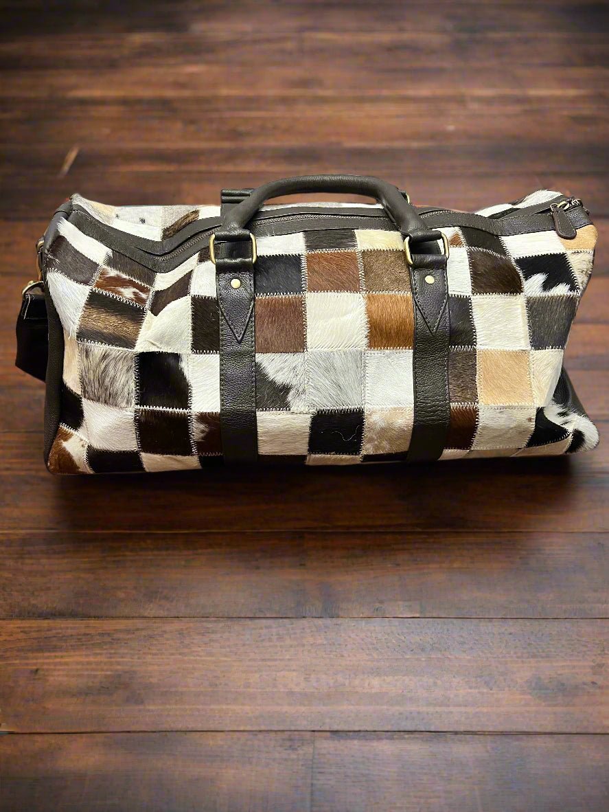 Western Full Hair-on-Hide Cowhide Duffle Bag — Black & White Compact Carry-On (21") - Rooted & Reckless Co.