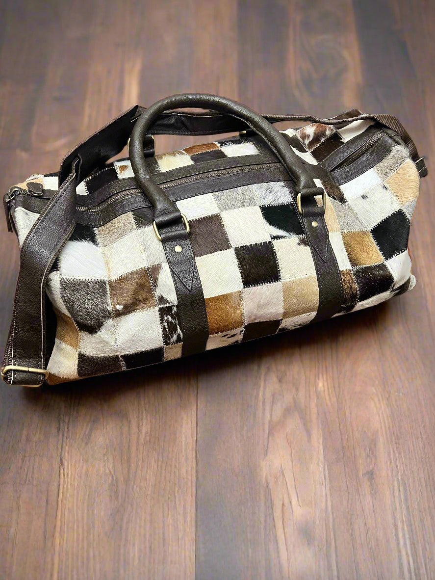 Western Full Hair-on-Hide Cowhide Duffle Bag — Black & White Compact Carry-On (21") - Rooted & Reckless Co.