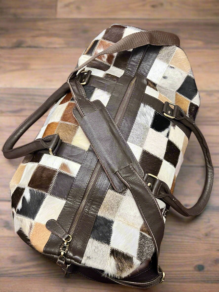 Western Full Hair-on-Hide Cowhide Duffle Bag — Black & White Compact Carry-On (21") - Rooted & Reckless Co.