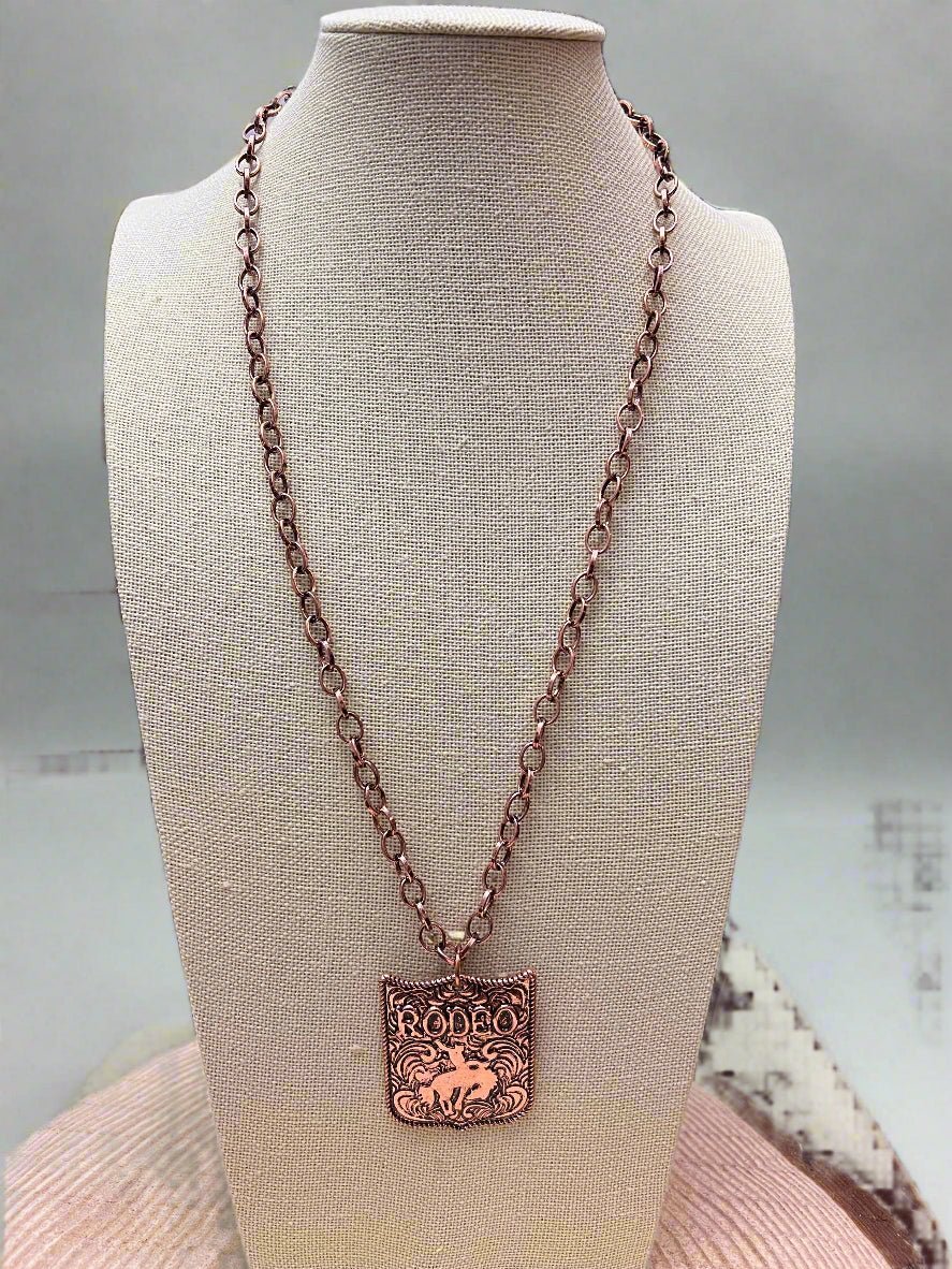 Western Rustic Brass Rodeo Pendant Necklace — 22 Inch Cowgirl Statement - Rooted & Reckless Co.