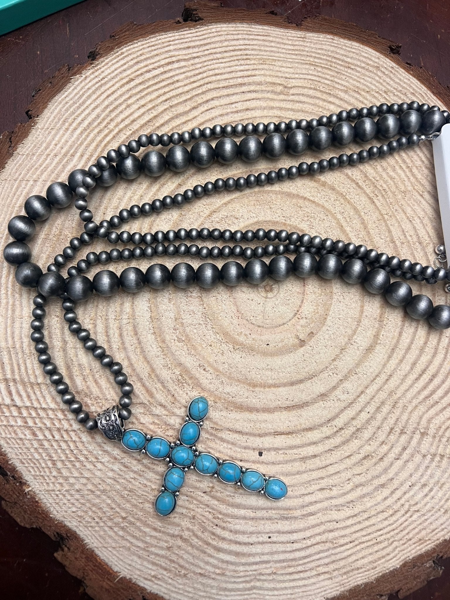 Western Turquoise Cross Three-Layered Necklace — Faux Pearl Trio with 3" Cross Pendant - Rooted & Reckless Co.