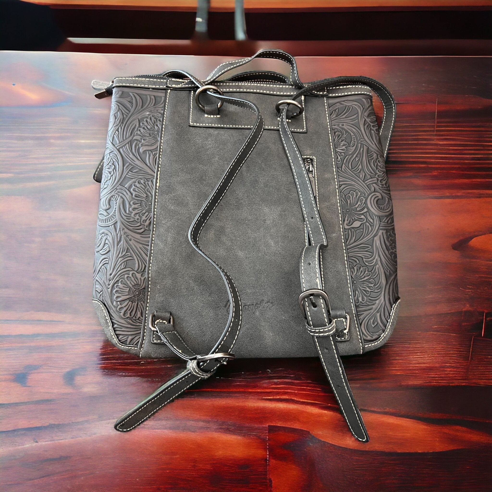 Wrangler Western Hair-on-Hide Backpack — Black & White Cowhide with Laptop/Tablet Sleeve - Rooted & Reckless Co.