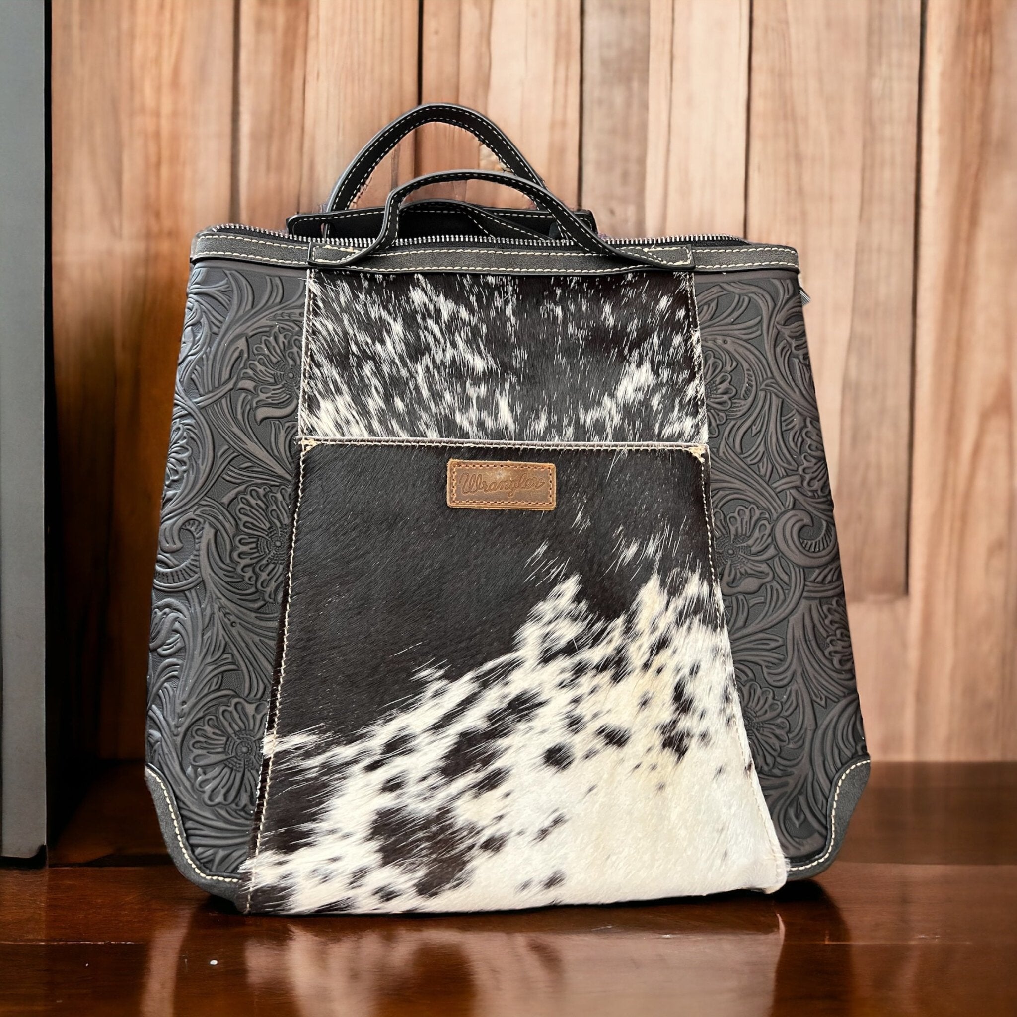 Wrangler Western Hair-on-Hide Backpack — Black & White Cowhide with Laptop/Tablet Sleeve - Rooted & Reckless Co.